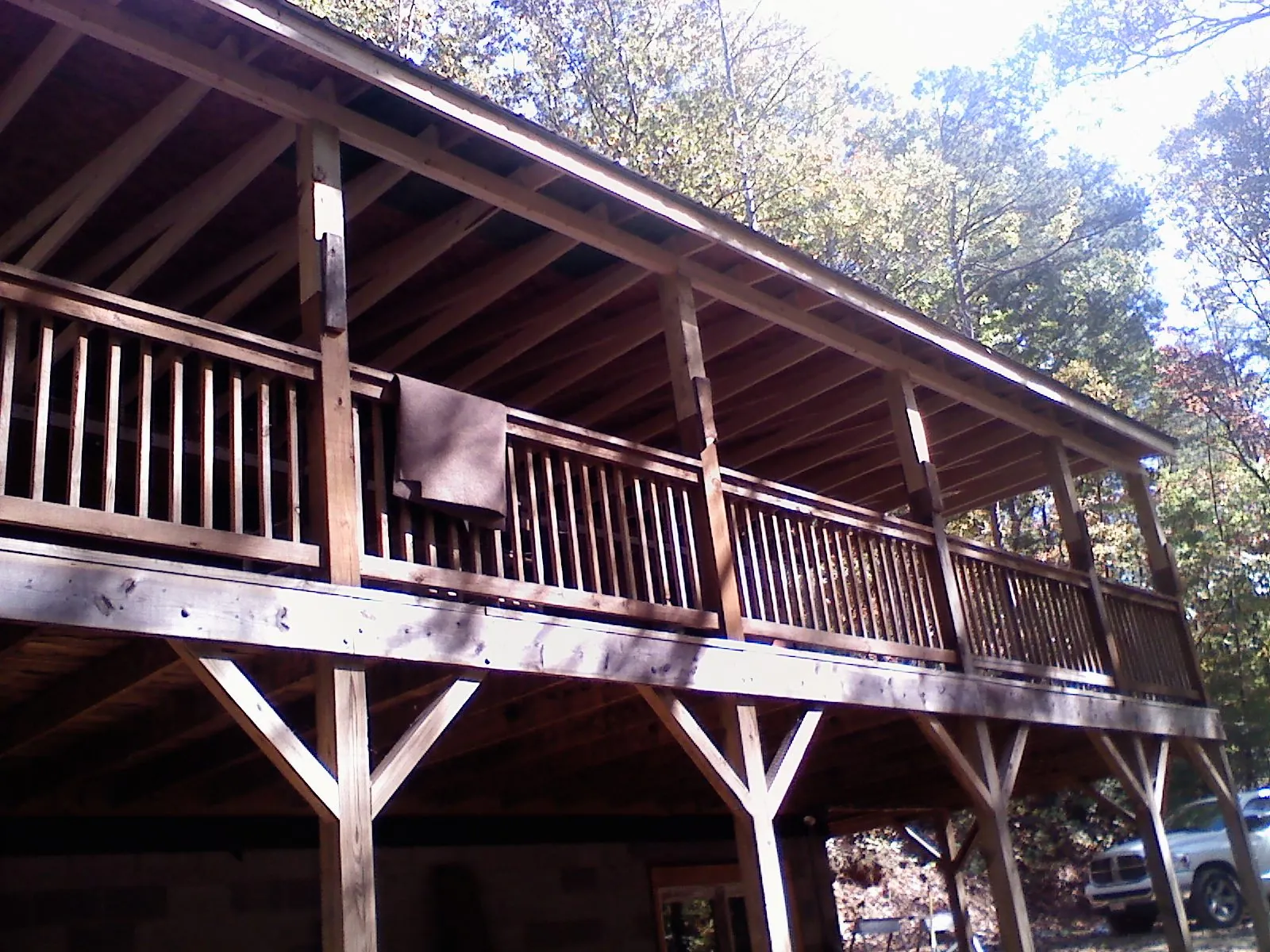 Timber framing under a new elevated porch and deck — Roof Leak Repair in Achille by Roofing Brothers
